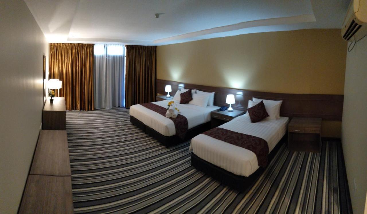 Temu Primula Hotel Kampong Seberang Timor Exterior photo
